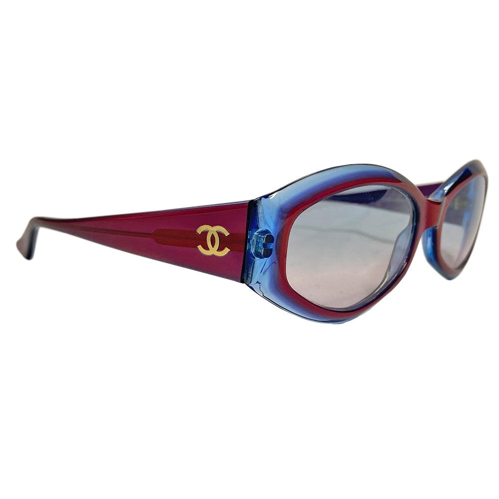1990’s Chanel red & blue acetate frame sunglasses with red gradient lenses by Karl Lagerfeld for Chanel embellished with gold tone side CC logos. Style: 5021 c 607  Made in Italy 