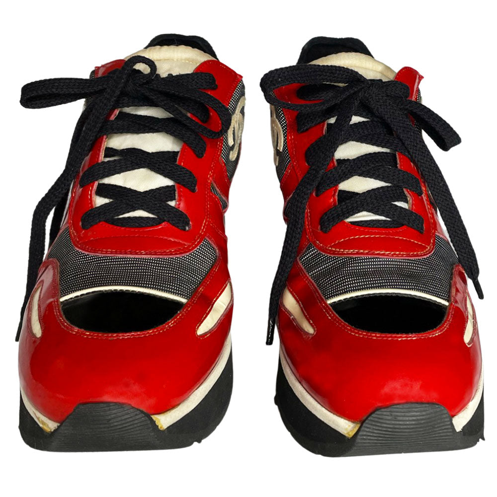 Chanel red with white patent block heel platform lace up sneakers by Karl Lagerfeld for Chanel, SS 1997 runway with nylon fabric inserts and tongue with CHANEL logo, white leather CC stitched logos on either side. Black rubber platform with white  stripe & black with white stripe stacked rubber block heel, Chanel logo treaded sole. Made in Italy 