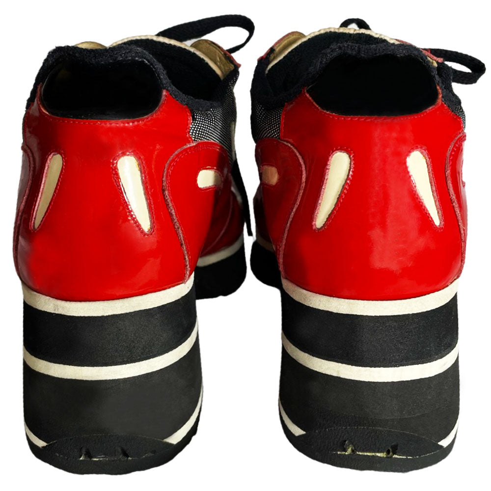 Chanel red with white patent block heel platform lace up sneakers by Karl Lagerfeld for Chanel, SS 1997 runway with nylon fabric inserts and tongue with CHANEL logo, white leather CC stitched logos on either side. Black rubber platform with white  stripe & black with white stripe stacked rubber block heel, Chanel logo treaded sole. Made in Italy 