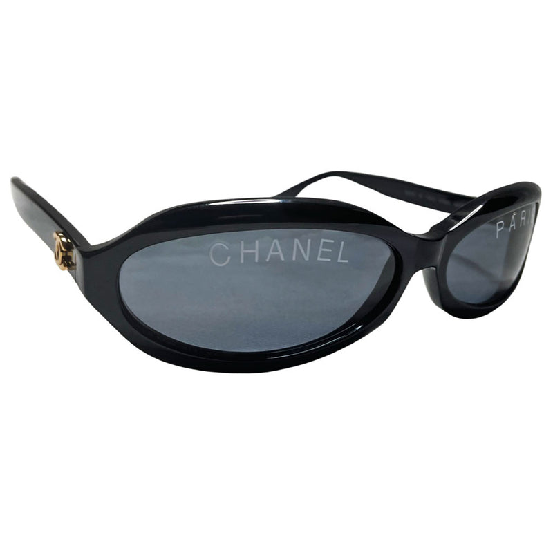 Chanel Paris logo oval acetate frame runway sunglasses by Karl Lagerfeld for Chanel, spring 1993 with gold CC logos on sides and "CHANEL PARIS" printed on lenses. Made in italy