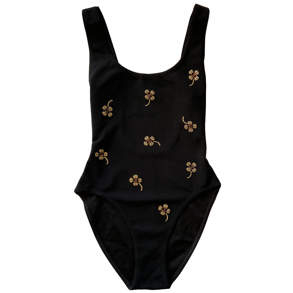 Chanel crystal appliqué embellished clover one-piece swimsuit by Karl Lagerfeld for Chanel 2001 Cruise Collection. Solid black stretch grosgrain fabric one-piece swimsuit with low back, front embellishments of tiny gold and bronze-tone appliqué crystal cc logo clovers and single logo clover in back. Size 36.  Made in France