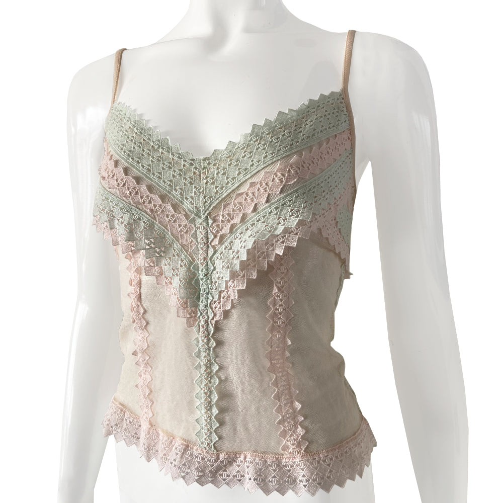 2004 embellished with diamond pattern accent with interlocking CC logos woven throughout. Three back CC logo buttons and bow at lower hem in pastel pink, mint, eggshell. Made in Italy 
