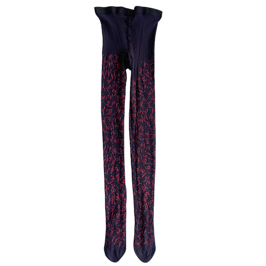 Chanel CC logo tights from Fall 2000 RTW runway collection by Karl Lagerfeld for Chanel. Blue color "patterned fancy tights” with all over ribbon design red CC logos, interlocking CC logos at waistband, cotton gusset, reinforced toes. Made in France 