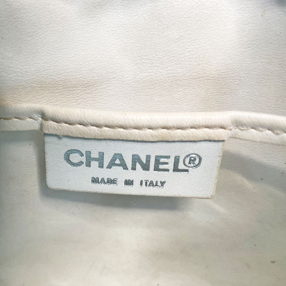 Chanel sky blue blue terry towel flap bag Karl Lagerfeld for Chanel 2002 with all over boxed cc logo embossed terry cloth flap bag with bold white acrylic chain strap, white cc front logo at flap, white zipper closure, white leather lining with one pvc pocket and 1 slip pocket. Made in Italy 