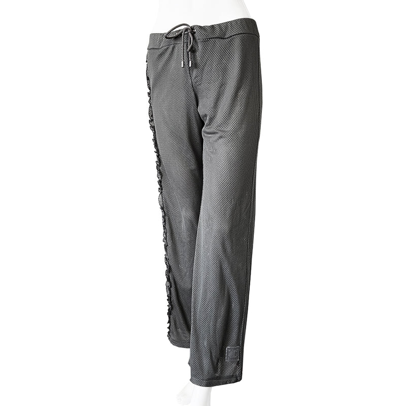 Chanel grey mesh drawstring pants with side frill from Spring 2003. High waisted wide leg pants made from see through double layered mesh with side zip pockets. Drawstring with CC logo engraved brushed silver-tone metal ends. Frill accent from waist to bottom hemline with Box CC logo at lower left leg. Made in Italy