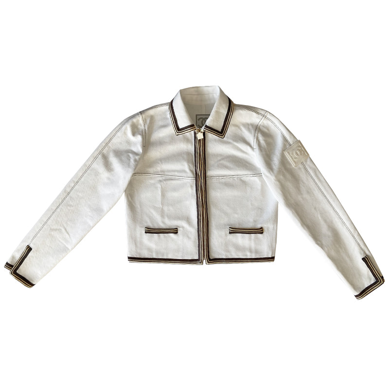 Chanel CC logo white canvas zip jacket by Karl Lagerfeld for Chanel, Cruise 2005 with accent stitching, brown and white striped knit accents, vented detail at sleeve hems. White CC logo zipper pull and white rubber box CC logo appliqué on arm. 100% Cotton 