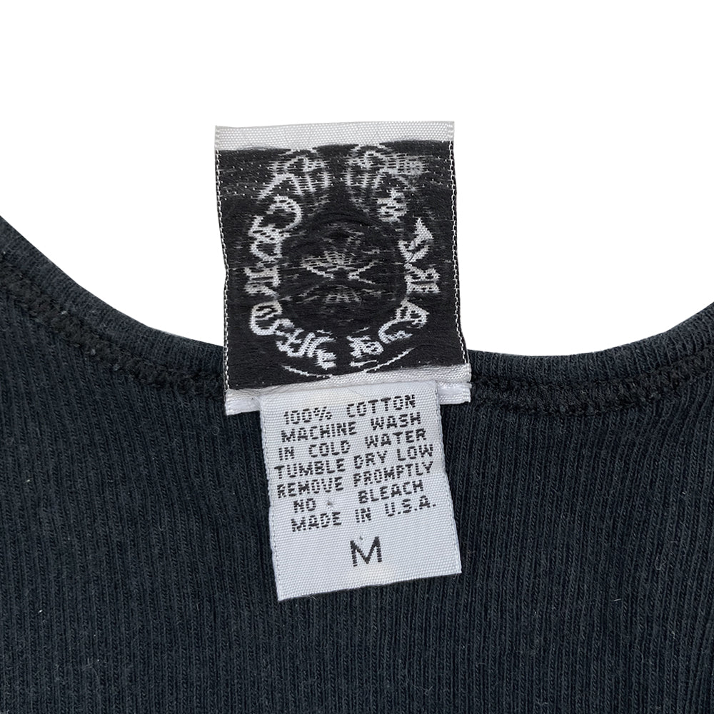 Chrome Hearts crystal heart logo tank, circa early 2000’s. Chrome Hearts crystal embellished design at chest, Chrome Hearts logo along back neckline with a crystal embedded at each end. Each crystal fastened with secure clamp fasteners. Made in USA 