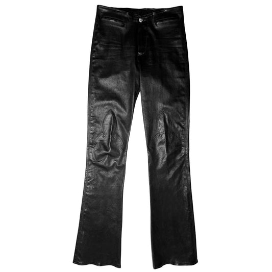Butter soft women’s boot cut leather pants with CH appliqué signature fleur de lis at front knees. Faux front slash pockets, zip fly closure with signature dagger zipper pull and sterling cross top button. Chrome Hearts USA banner embossed leather patch at interior waist. Made in USA 