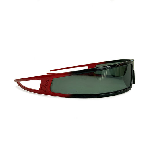 Christian Dior Bandage Runway Sunglasses From John Galliano Fall 2003 Ready to Wear Runway Collection with no Scratches on lens. Wrap around frame and lens with double banded arms. Color: Black lenses, black frame with red arms. Made in Italy. Side "DIOR” stamped logo. Includes Information booklet, case & branded neck strap included 