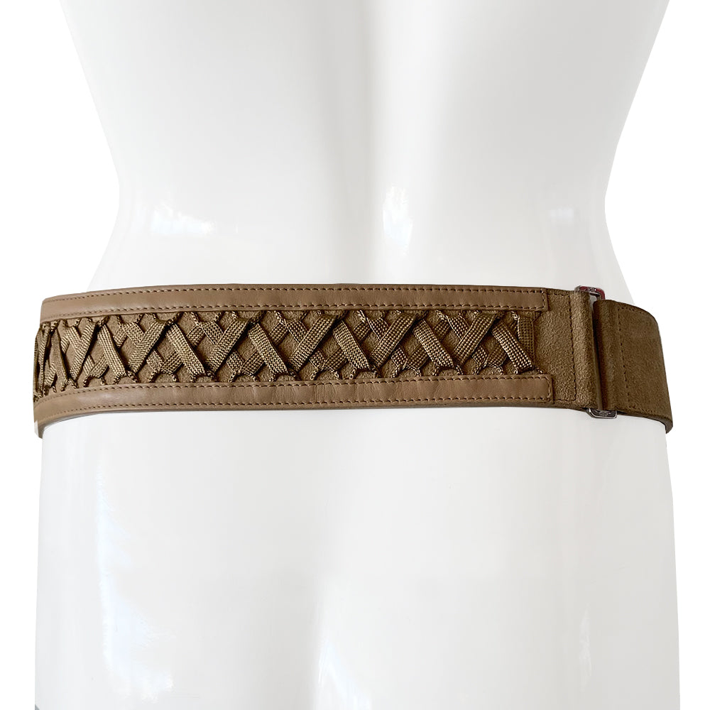 Christian Dior Suede Admit It lace-up corset belt in soft tan color from Autumn 2002 RTW collection by John Galliano. Criss-cross lace up detail with woven corset laces with silver aglet-tipped ends. Silver-tone double pronged buckle and Dior logo plate at front with adjustable sizing. Made in Italy 