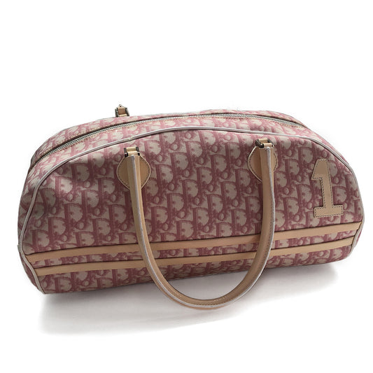 Christian Dior large tote by John Galliano, 2004. Pink monogram canvas with white leather piping, nude patent leather accent trim and number 1 on front, 2 leather rolled handles 