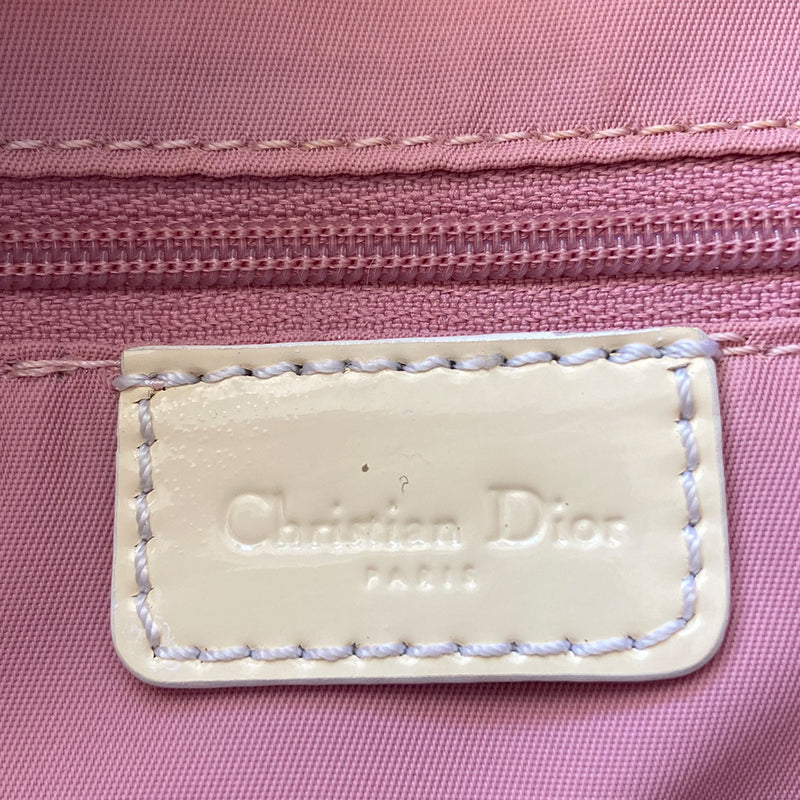 Christian Dior pink Girly Boston bag by John Galliano for Dior, 2004. Crystal front Dior logo and patent leather No. 1 with crystals, 2 logo ribbon straps, white leather flowers with pearl centres. White patent leather rolled top handles, top zipper, crystal encrusted lock. Pink textile interior, 1 inside zip pocket. Made in Italy 
