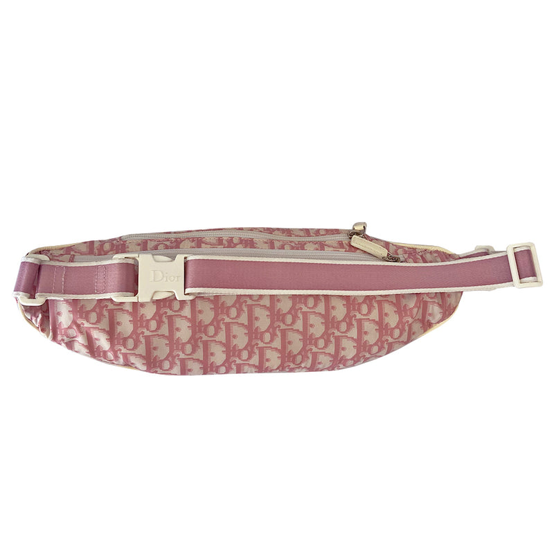 Christian Dior pink monogram canvas waist pouch John Galliano for Dior, 2004 with white patent leather appliqué No 2, dual front stripes and piping. Pink with white edge satin webbing adjustable belt with white plastic logo clip closure. Pink textile lined interior, two rear zip pocket. Made in Spain