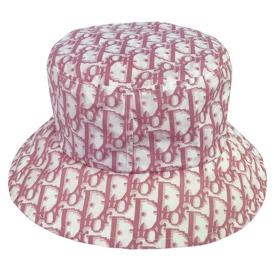 Christian Dior pink monogram bucket hat by John Galliano for Dior, 2005. Diorissimo print bucket hat with 2” brim. Tag size: 58.  Made in France. 