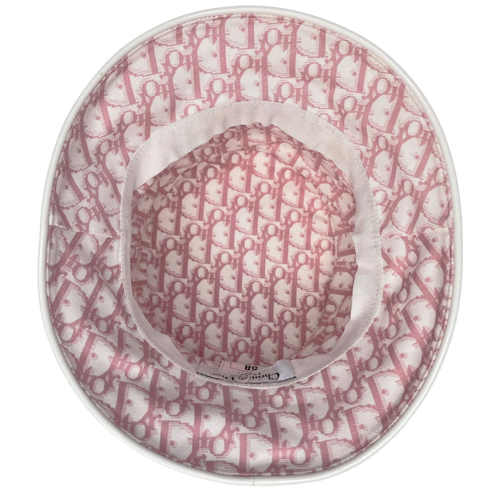 Unused Christian Dior pink monogram Girly collection bucket hat by John Galliano for Dior, spring 2004 adorned with flowers, pearls, Swarovski crystal Dior logo on brim and surrounding leather No 1 in front, patent leather piping. Made in France
