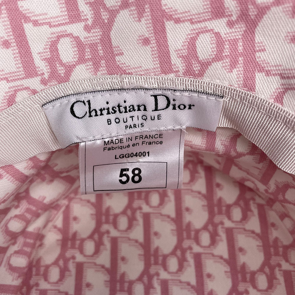 Unused Christian Dior pink monogram Girly collection bucket hat by John Galliano for Dior, spring 2004 adorned with flowers, pearls, Swarovski crystal Dior logo on brim and surrounding leather No 1 in front, patent leather piping. Made in France