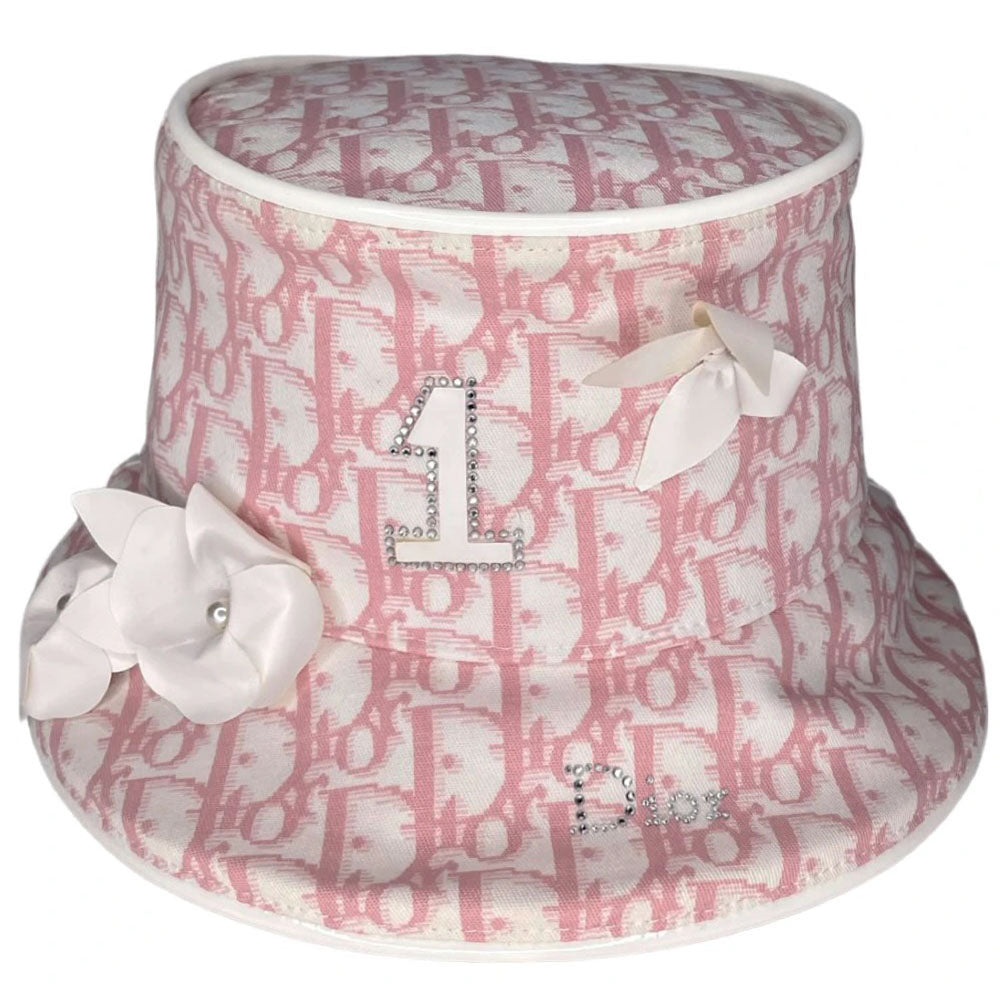 Unused Christian Dior pink monogram Girly collection bucket hat by John Galliano for Dior, spring 2004 adorned with flowers, pearls, Swarovski crystal Dior logo on brim and surrounding leather No 1 in front, patent leather piping. Made in France
