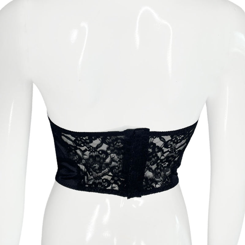 Christian Dior vintage bustier circa 1990's with black silk front V, lace and mesh cutouts, pearly beaded front flower detail, hook and eye back closure. 