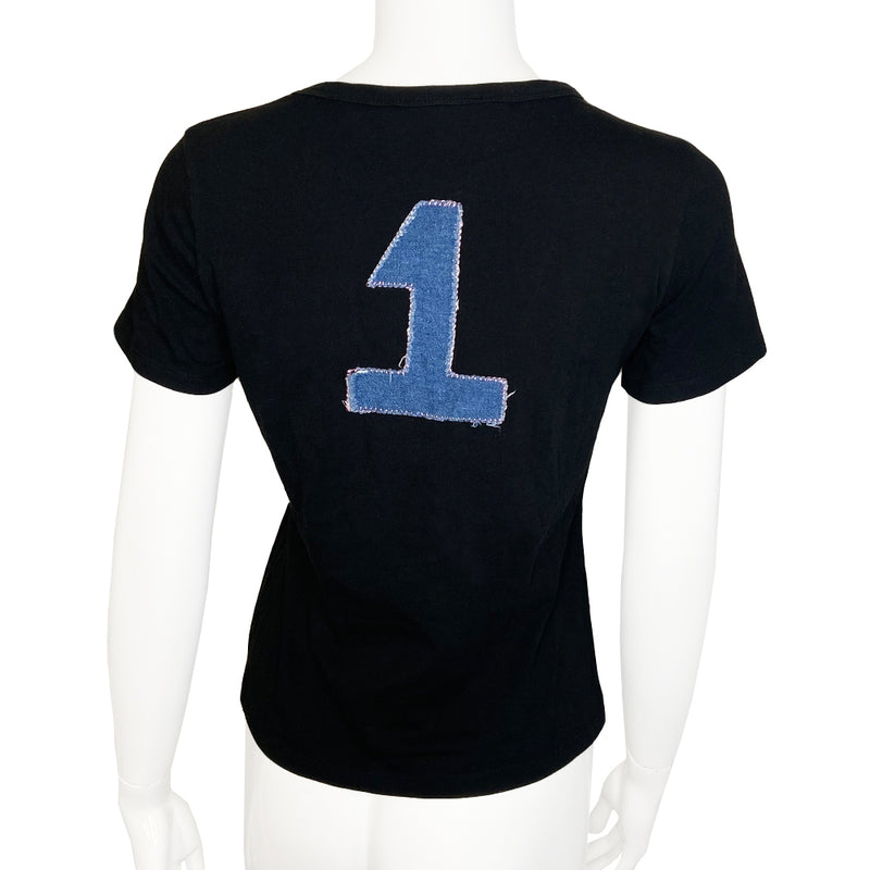 J'adore Dior denim appliqué short sleeve black tee by John Galliano for Dior, spring 2002 with light blue frayed denim Dior appliqué with contrast pink embroidered stitching in front and No 1 in back. Made in France