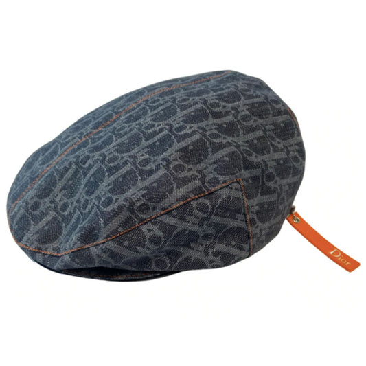 John Galliano for Dior, 2004 navy monogram denim cap with orange contrast stitching, orange band, calf leather accent trim, orange rubber Dior logo hanging tag attached. Grosgrain interior ribbon, lined in navy nylon. Made in France