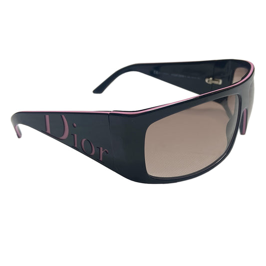 Christian Dior Your Dior 1 sunglasses with black wrap frame and embedded pink pinstripe, wide arms and pink Dior logo embossed at each, grey gradient lenses. Made in Italy