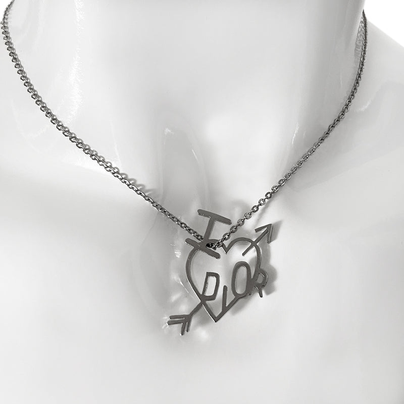 Christian Dior Heart and Arrow silver-tone necklace by John Galliano for Dior, circa 2004 with adjustable chain and hanging charm featuring the signature I heart Dior symbols with piercing arrow. 4 square loops adjust the length with tiny hanging engraved Dior logo D in back 
