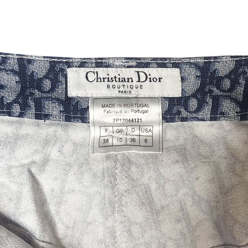 Christian Dior navy monogram 5 pocket flare pants John Galliano for Dior, spring 2002 with silver-tone logo top button, bottom flare Double white stripe accent along inner leg seams. Made in Portugal 