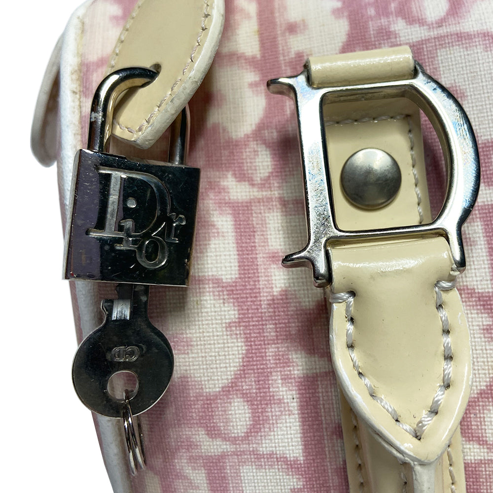 Christian Dior pink monogram mini boston by John Galliano for Dior, 2004 Pink monogram canvas with leather piping patent leather accent, rolled handles attached with silver-tone metal logo D. Pink textile interior with one zip pocket and one snap pocket, silver zipper and hardware. Included: Lock and key. Made in Italy 