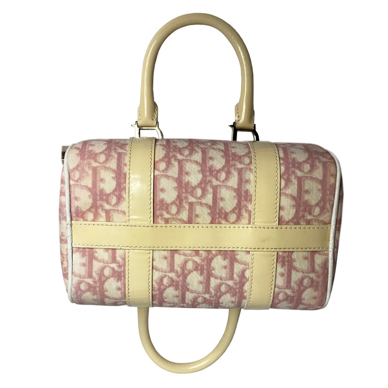Christian Dior pink monogram mini boston by John Galliano for Dior, 2004 Pink monogram canvas with leather piping patent leather accent, rolled handles attached with silver-tone metal logo D. Pink textile interior with one zip pocket and one snap pocket, silver zipper and hardware. Included: Lock and key. Made in Italy 
