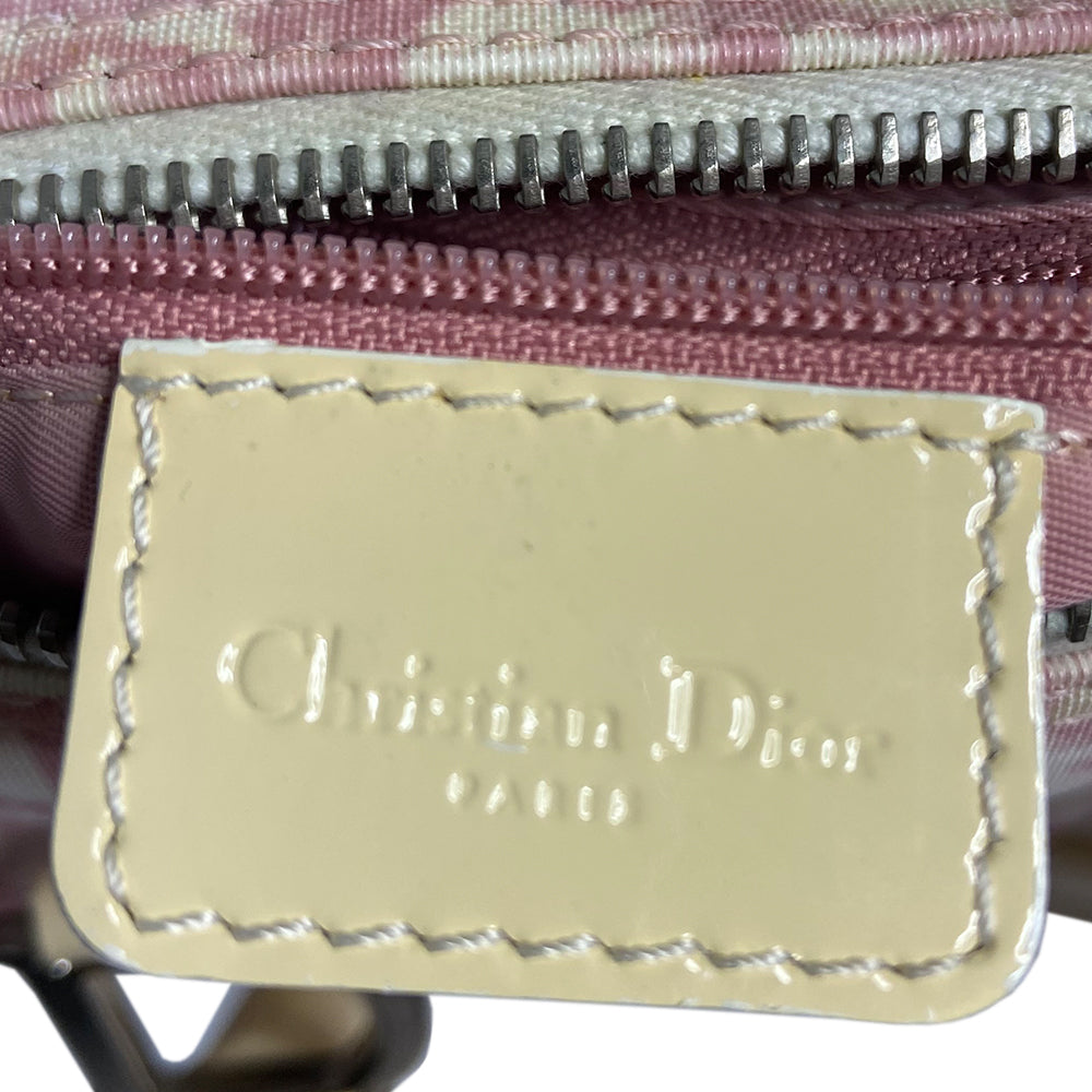 Christian Dior pink monogram mini boston by John Galliano for Dior, 2004 Pink monogram canvas with leather piping patent leather accent, rolled handles attached with silver-tone metal logo D. Pink textile interior with one zip pocket and one snap pocket, silver zipper and hardware. Included: Lock and key. Made in Italy 