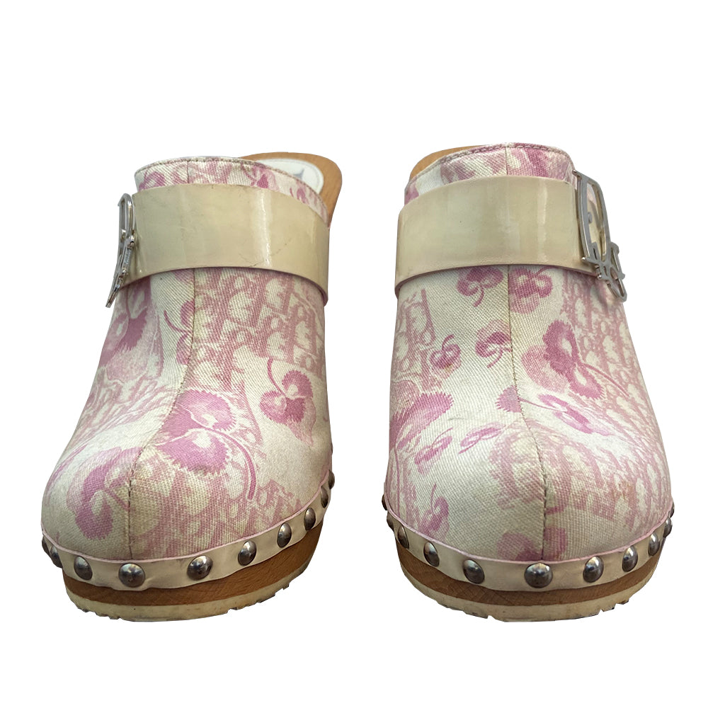 Christian Dior pink cherry blossom monogram platform wood sole clogs by John Galliano for Dior, spring 2003. Diorissimo cherry blossom canvas upper, patent leather accent strap with attached silver-tone Dior logo, silver-tone side studs. Made in Italy 
