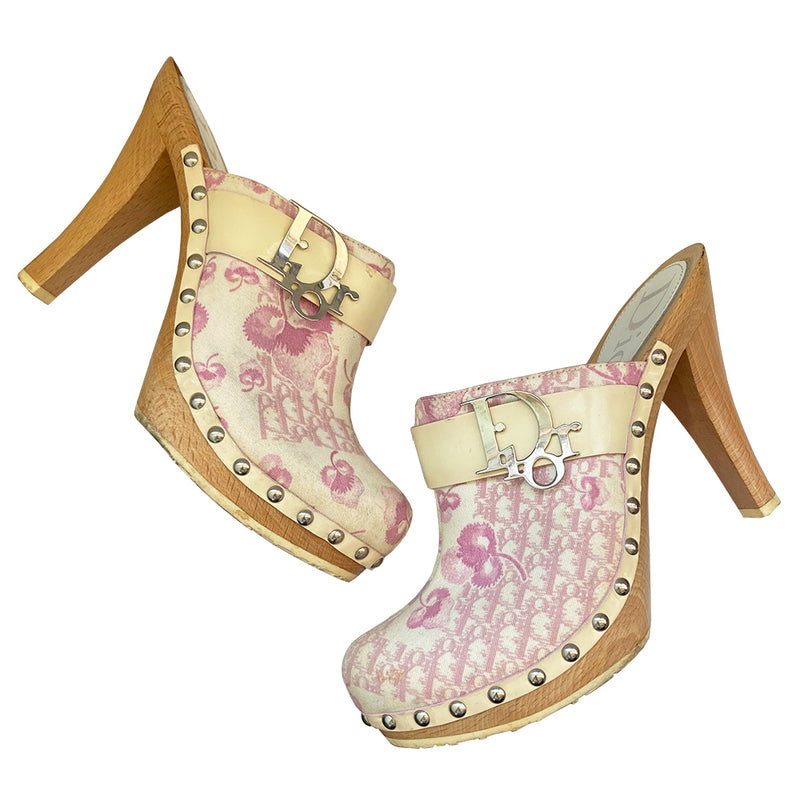 Christian Dior pink cherry blossom monogram platform wood sole clogs by John Galliano for Dior, spring 2003. Diorissimo cherry blossom canvas upper, patent leather accent strap with attached silver-tone Dior logo, silver-tone side studs. Made in Italy 