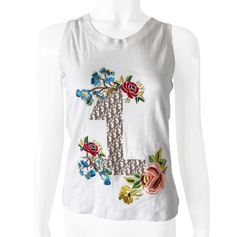 Christian Dior embroidered No 1 white sleeveless tee by John Galliano for Dior, summer 2005. Banded neck and arm holes with Diorissimo printed No 1 and colorful embroidered flowers, original tag attached. Made in France 