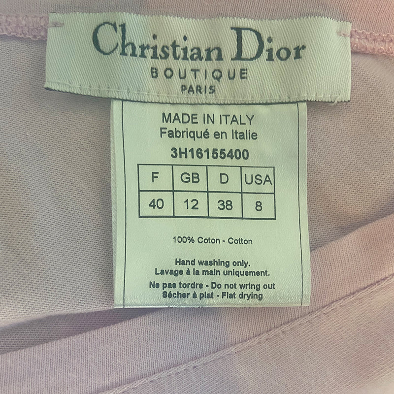 Christian Dior J’Adore Dior cap sleeve front and back V neck light pink tee by John Galliano for Christian Dior, FW 2003 with velvety appliqué lettering J’Adore Dior in front with World Champion 1947 in back. Made in Italy 