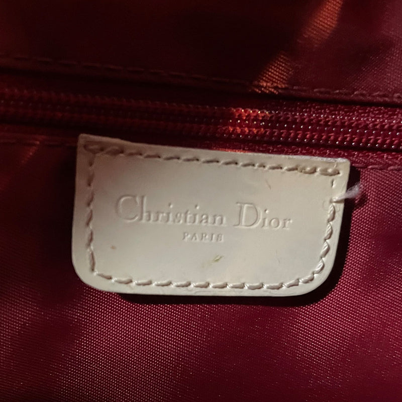 Christian Dior red monogram canvas slim reporter bag by John Galliano for Dior 2004 with white patent No 1 and 2 stripes in front, piping and accents, red with white edged satin canvas webbing adjustable shoulder strap. Top zip closure with red textile interior and one interior zip pocket. Made in Italy 