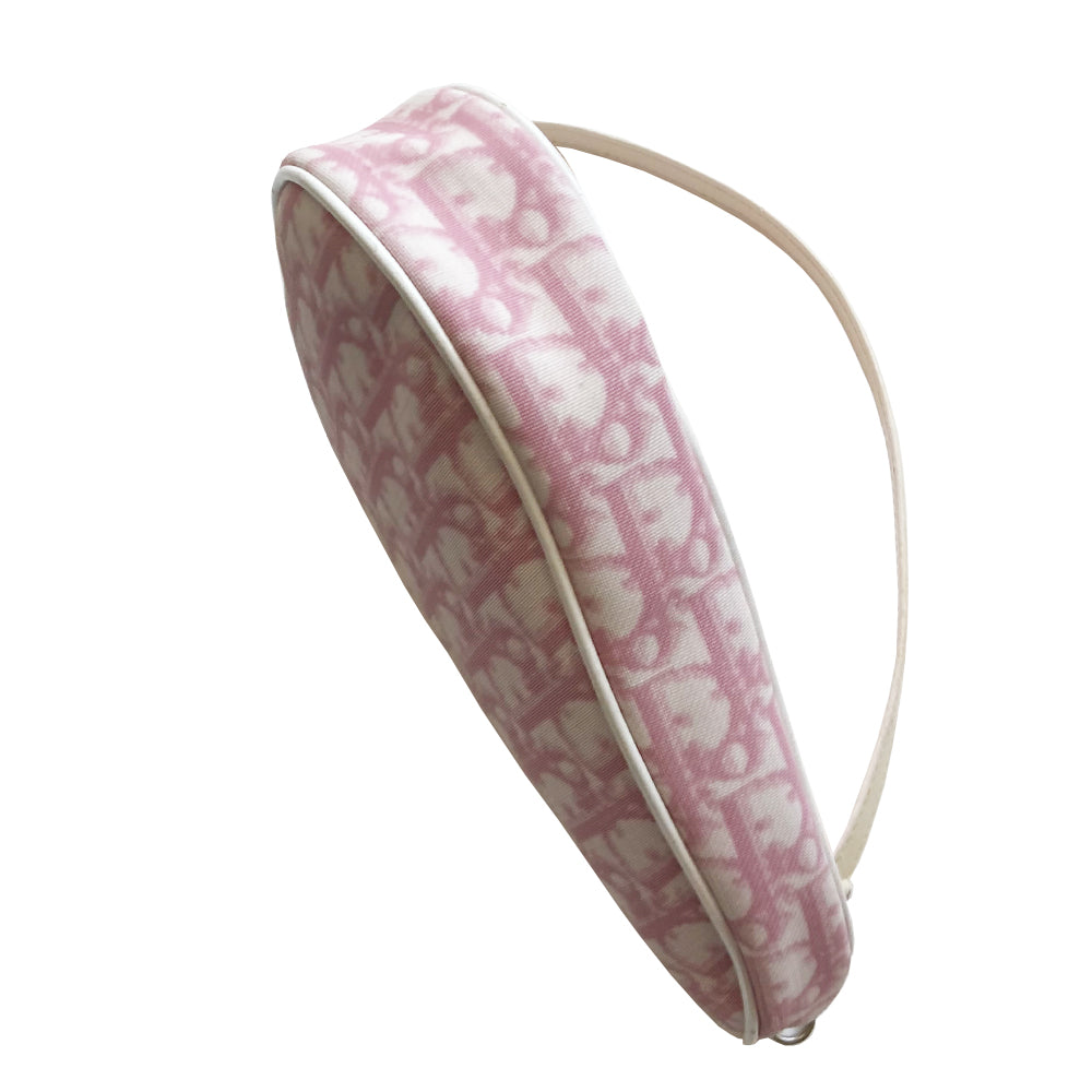 Christian Dior pink Diorissimo canvas saddle Bag John Galliano for Dior 2004.  Diorissimo canvas saddle pochette with white leather piping and strap, silver-tone hardware. Leather strap unclips at one end that loops to carry wristlet style. Zip closure with Dior embossed leather zipper pull, pink textile interior. Made in Spain 