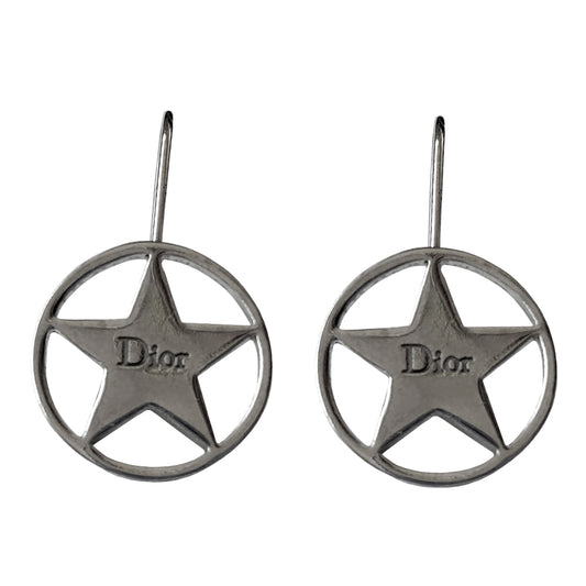 Christian Dior Silver Star Earrings Hook style silver-tone drop earrings featuring star with center Dior logo surrounded by a silver-tone circle. 