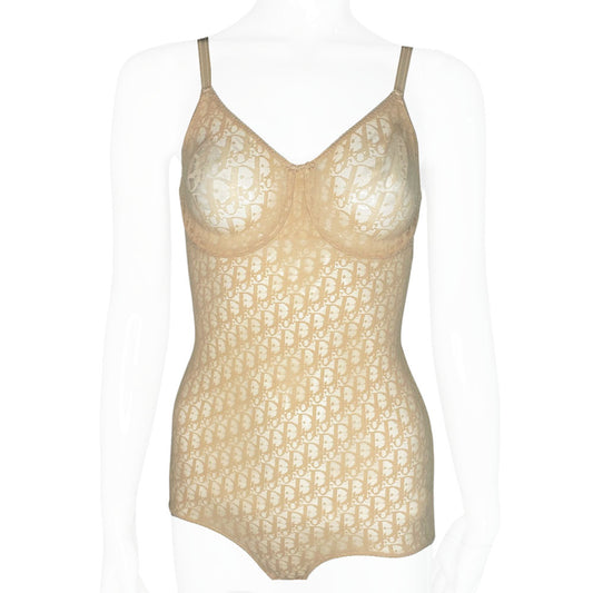 Neutral tone Christian Dior Monogram slip-on stretch bodysuit circa 1990s with low back, adjustable elastic straps, underwire at bust, hooks at crotch. Made in USA 