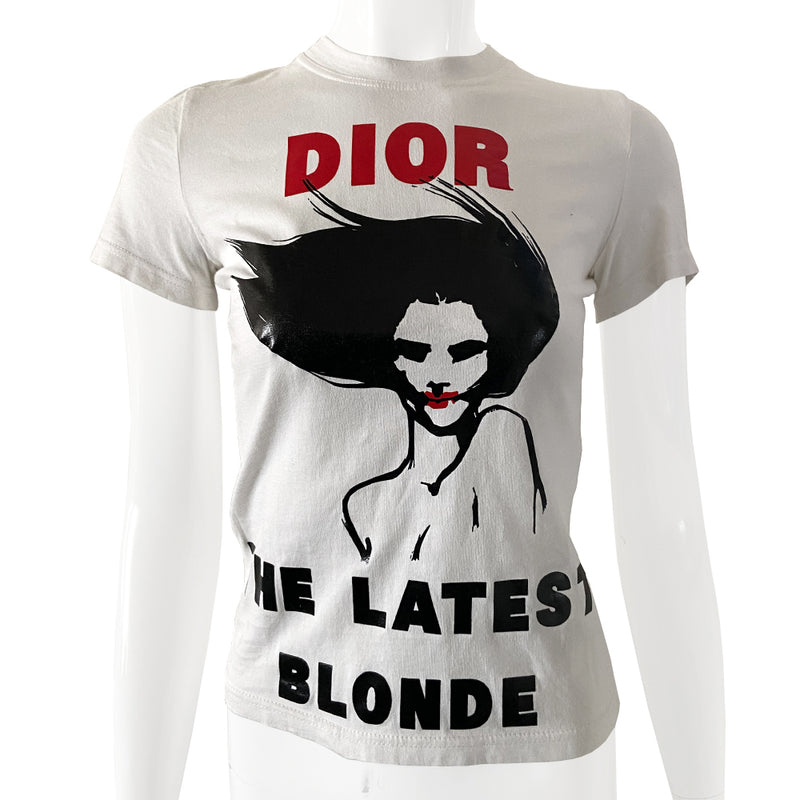 Christian Dior The Latest Blonde short sleeve tee in white by John Galliano for Christian Dior, Autumn 2003 with DIOR printed in bold red, female figure with red lips and THE LATEST BLONDE in bold print underneath. Made in France 