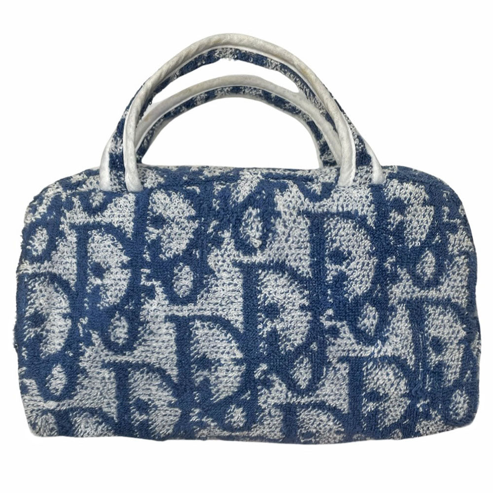 Christian Dior navy monogram mini terry fabric boston bag circa 2005 with No. 2 white appliqué in front, white piping on handles and at zipper, waterproof vinyl interior with 2 slip pockets, zipper closure, white textile ribbon zipper pull. 