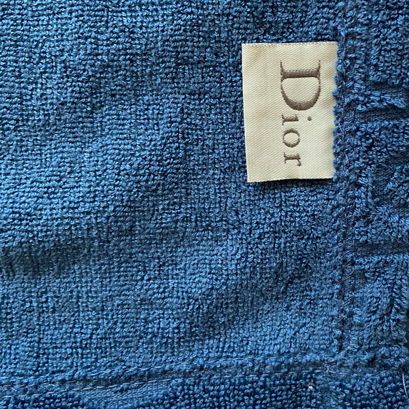 Christian Dior marine blue towel and backpack set with all over Dior logo jacquard terry towelling fabric with drawstring closure backpack and matching logo jacquard towel Fabric: 100% Cotton. Made in France 