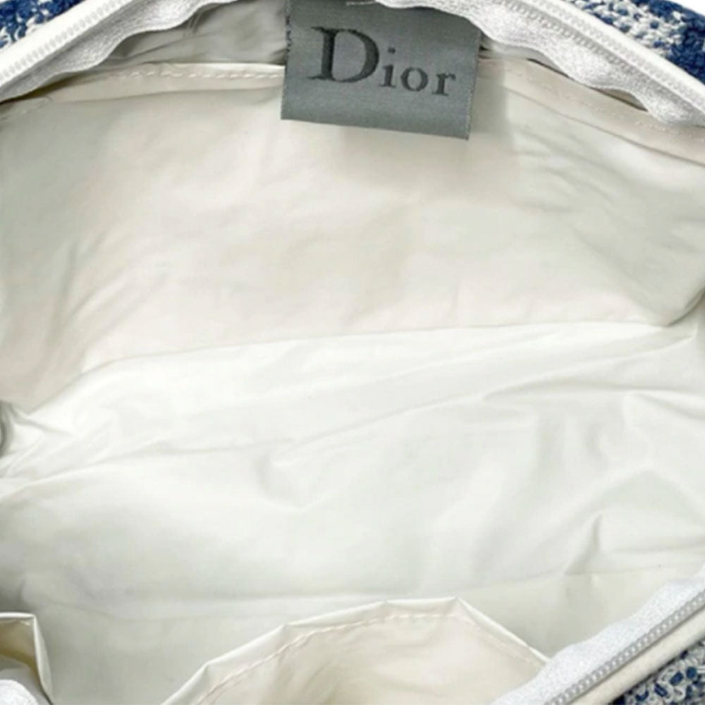 Christian Dior navy monogram mini terry fabric boston bag circa 2005 with No. 2 white appliqué in front, white piping on handles and at zipper, waterproof vinyl interior with 2 slip pockets, zipper closure, white textile ribbon zipper pull. 