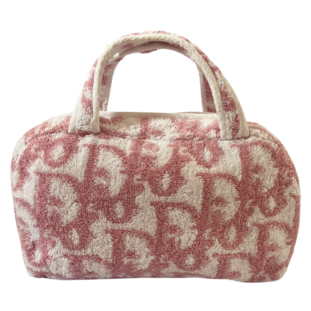 Circa 2005 Mini pink diorissimo monogram terry cloth boston bag with white piping on handles and at zipper, waterproof white vinyl interior with 2 slip pockets, zipper closure.