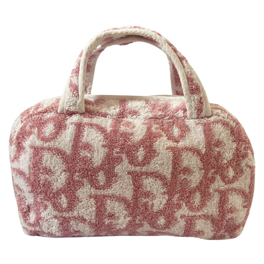 Circa 2005 Mini pink diorissimo monogram terry cloth boston bag with white piping on handles and at zipper, waterproof white vinyl interior with 2 slip pockets, zipper closure.