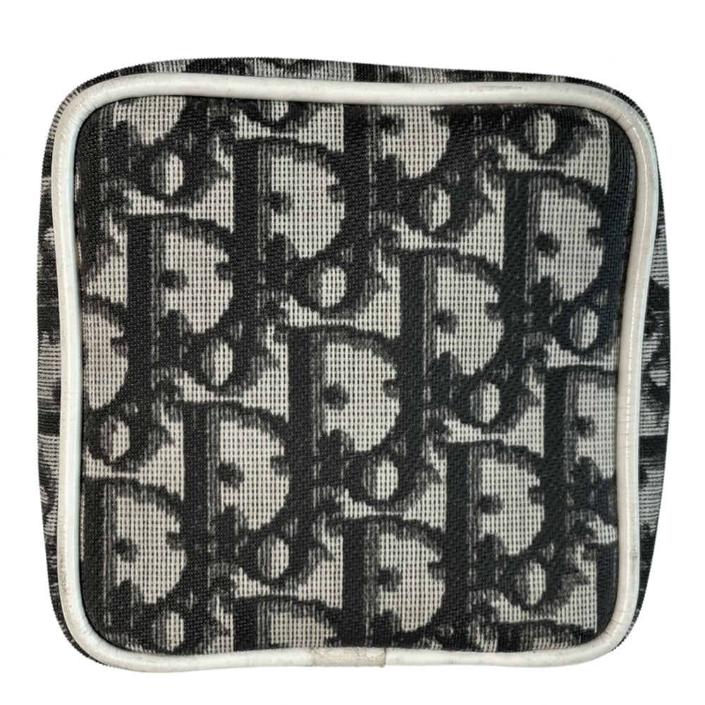Christian Dior canvas black and grey monogram top handle mini rectangular cylinder bag by John Galliano for Dior, 2003 with white patent piping, top handle and leather No 2 appliqué. Wrap around silver-tone top zipper closure opens to black textile interior. Made in Spain 