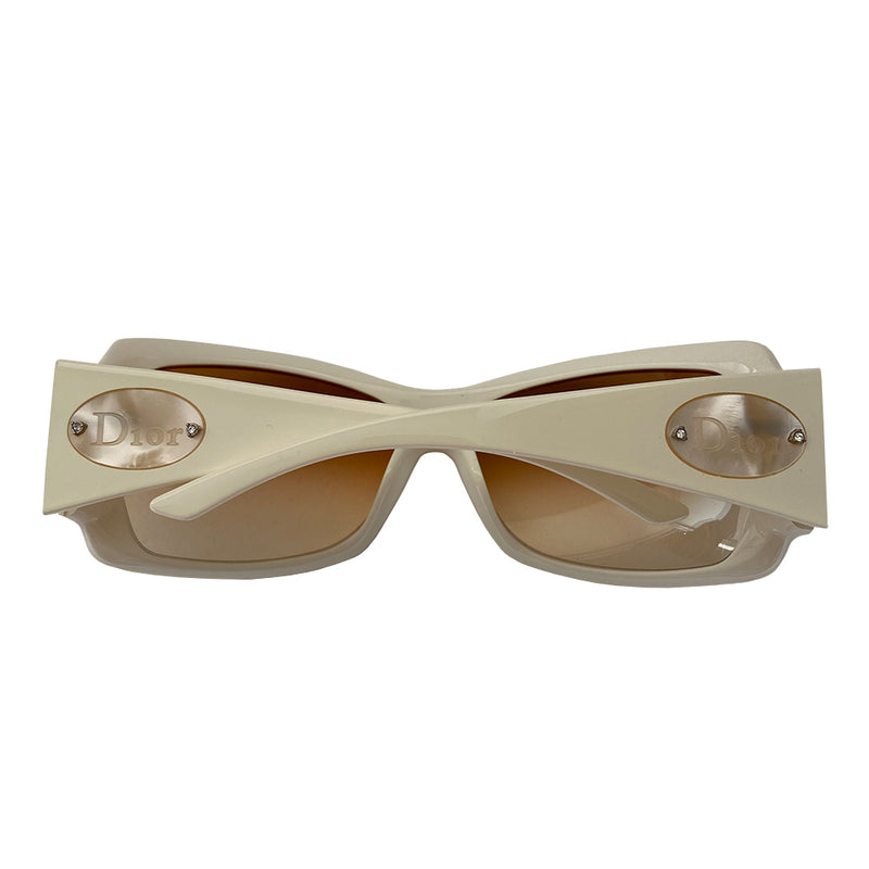 Christian Dior ivory frame sunglasses with amber gradient lenses and wide arms Dior embossed oval mother of pearl Dior name plate attached with embedded crystals at each arm. Style: Classicdior 1/F CQLBA Condition: Excellent, no scratches on lenses or frame Made in Italy 
