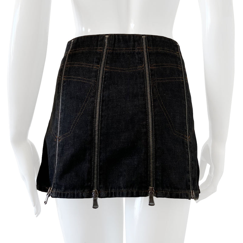 Dolce & Gabbana Zip Panel Black Denim Mini Skirt from 2004 with 10 zippered denim panels and silver-tone D&G stamped zipper pulls that unzip individually from bottom to top.  Accent stitching to mimic jeans pockets in back and front. D&G tag attached to faux front pocket. Made in italy