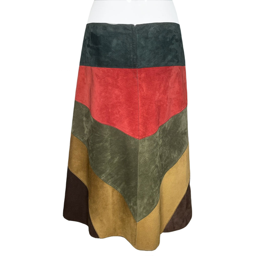 FW 2002 patchwork A-line red, turquoise, olive and tan suede skirt with slight rise in front hemline, lacing at front waist, silk jacquard logo lining, invisible back zipper. Made in Italy 