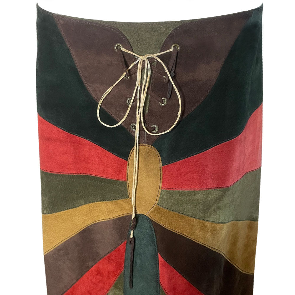 FW 2002 patchwork A-line red, turquoise, olive and tan suede skirt with slight rise in front hemline, lacing at front waist, silk jacquard logo lining, invisible back zipper. Made in Italy 