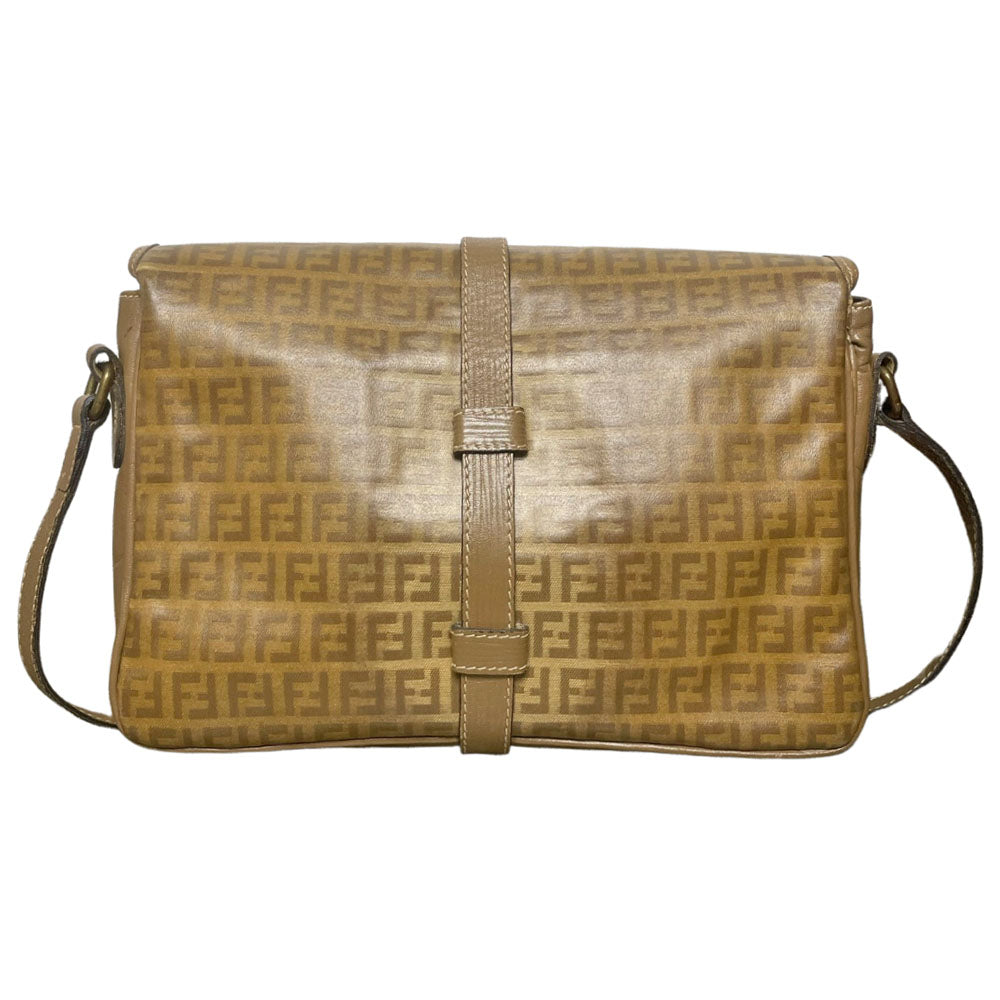 Fendi SAS circa 1970's tan and brown patent leather monogram FF Zucca print cross-body bag with front closure strap that wraps around bag and through brushed gold tone hardware. Long leather strap suitable to wear cross body, brown leather lining with three open interior sections and one zip pocket. Made in Italy 